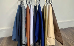 Various coloured fabric on hangers